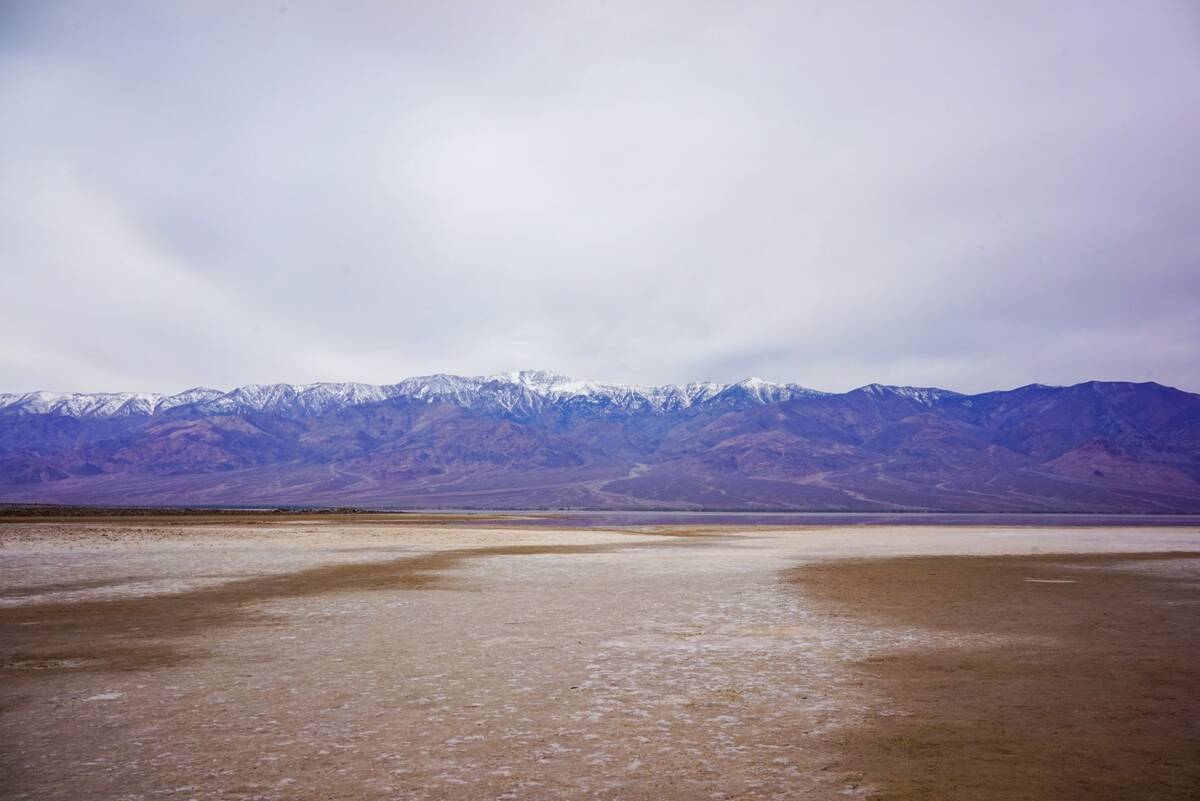 Just a few inches deep, a small version of Lake Manly has formed near Badwater Basin after reco ...