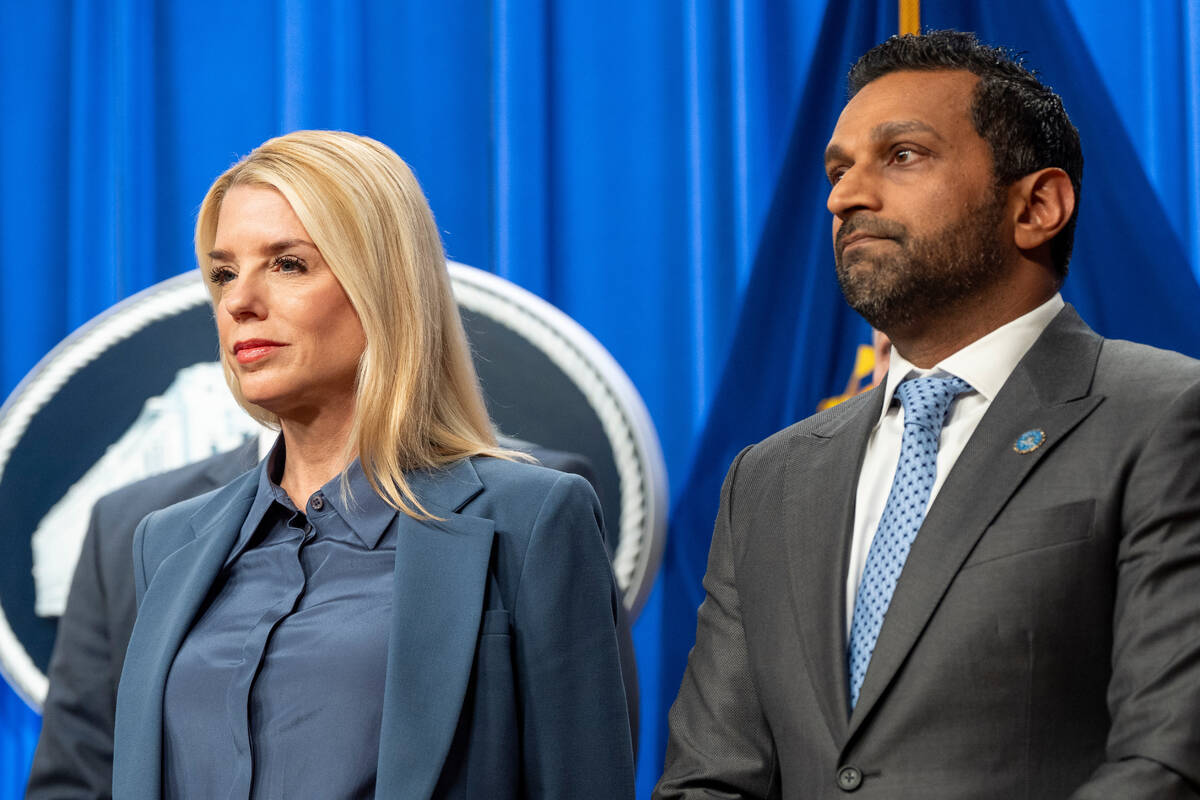 Attorney General Pam Bondi, left, and FBI Director Kash Patel stand during a news conference at ...