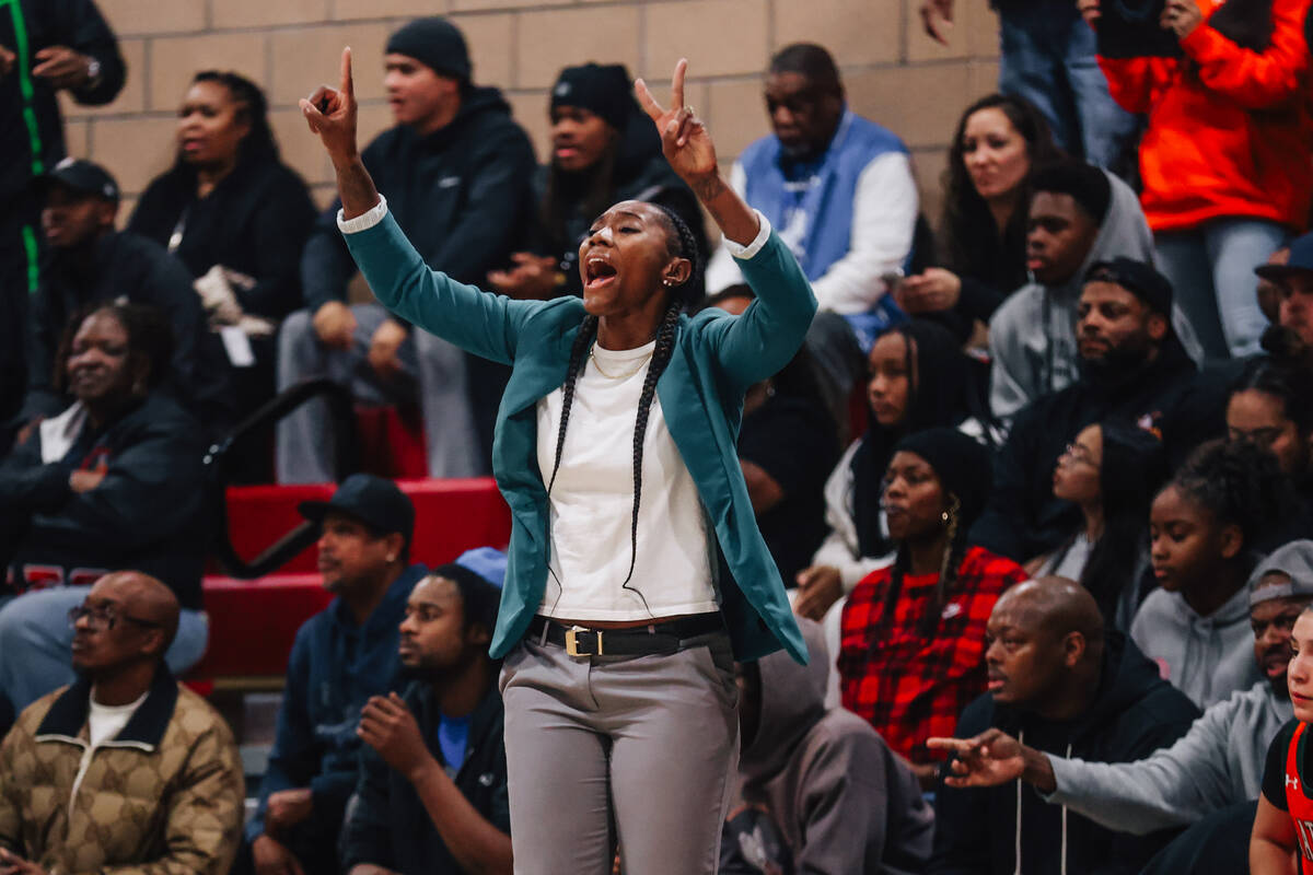 Mojave head coach Sequoia Holmes coaches her team during a basketball game between Mojave and L ...