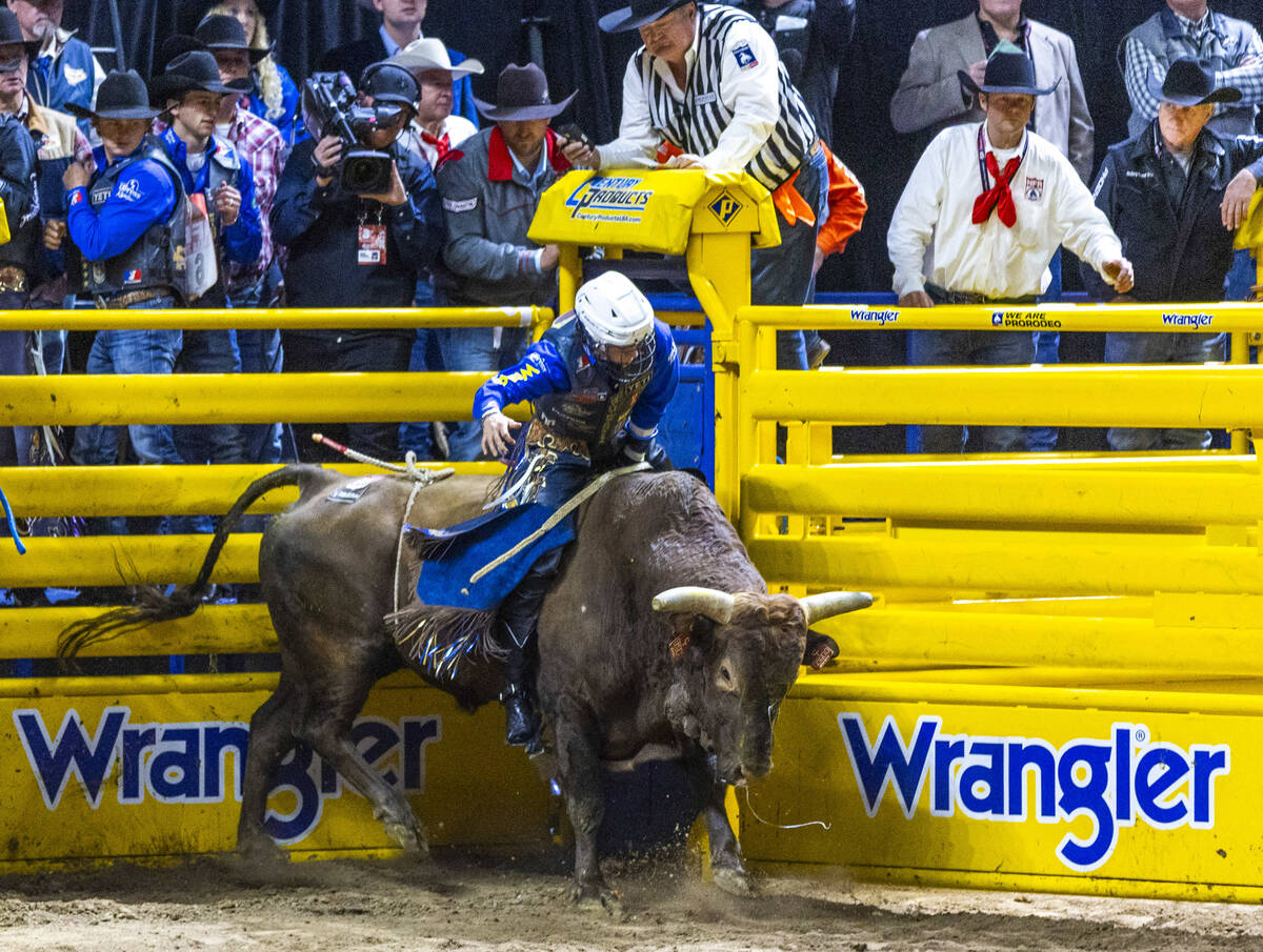 Stetson Wright rides Orbit on his way to a win in Bull Riding during Day 2 of National Finals R ...