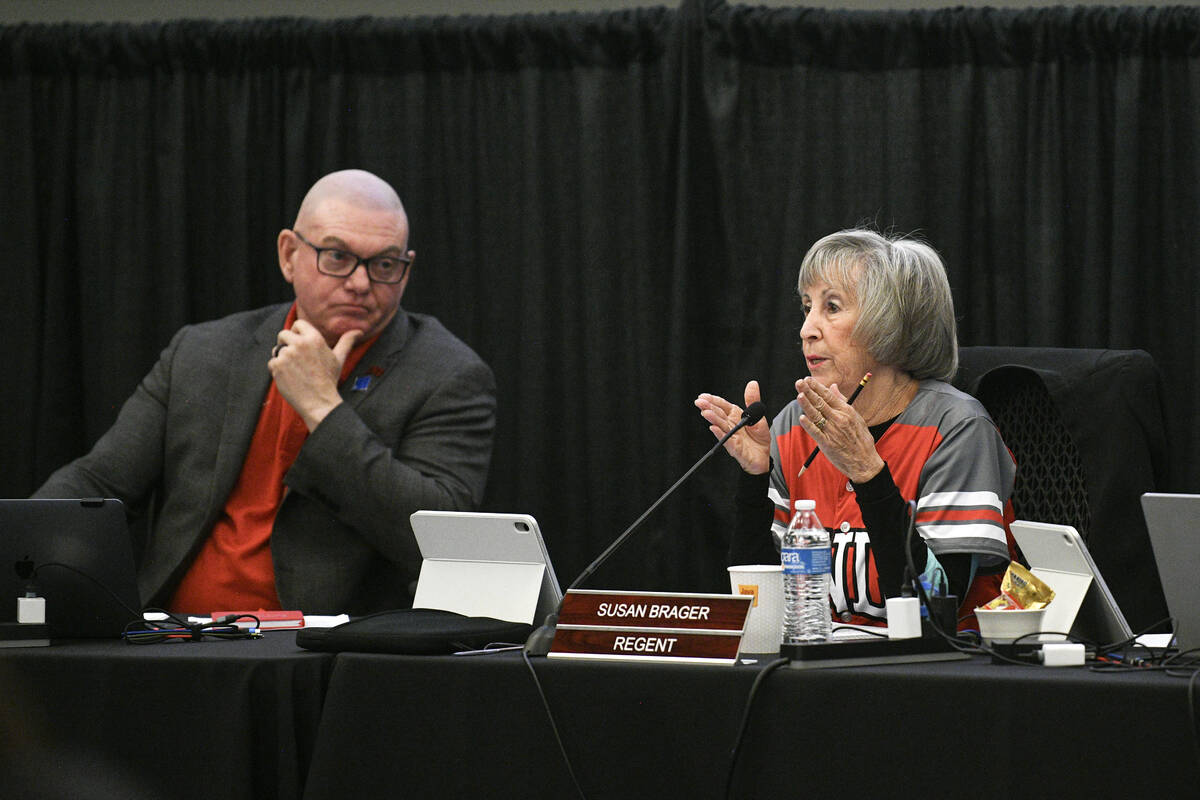 Nevada Board of Regents Chairman Byron Brooks listens as Regent Susan Brager speaks during the ...