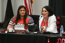 Nevada System of Higher Education Regent Heather Brown listens as fellow Regent Stephanie Goodm ...