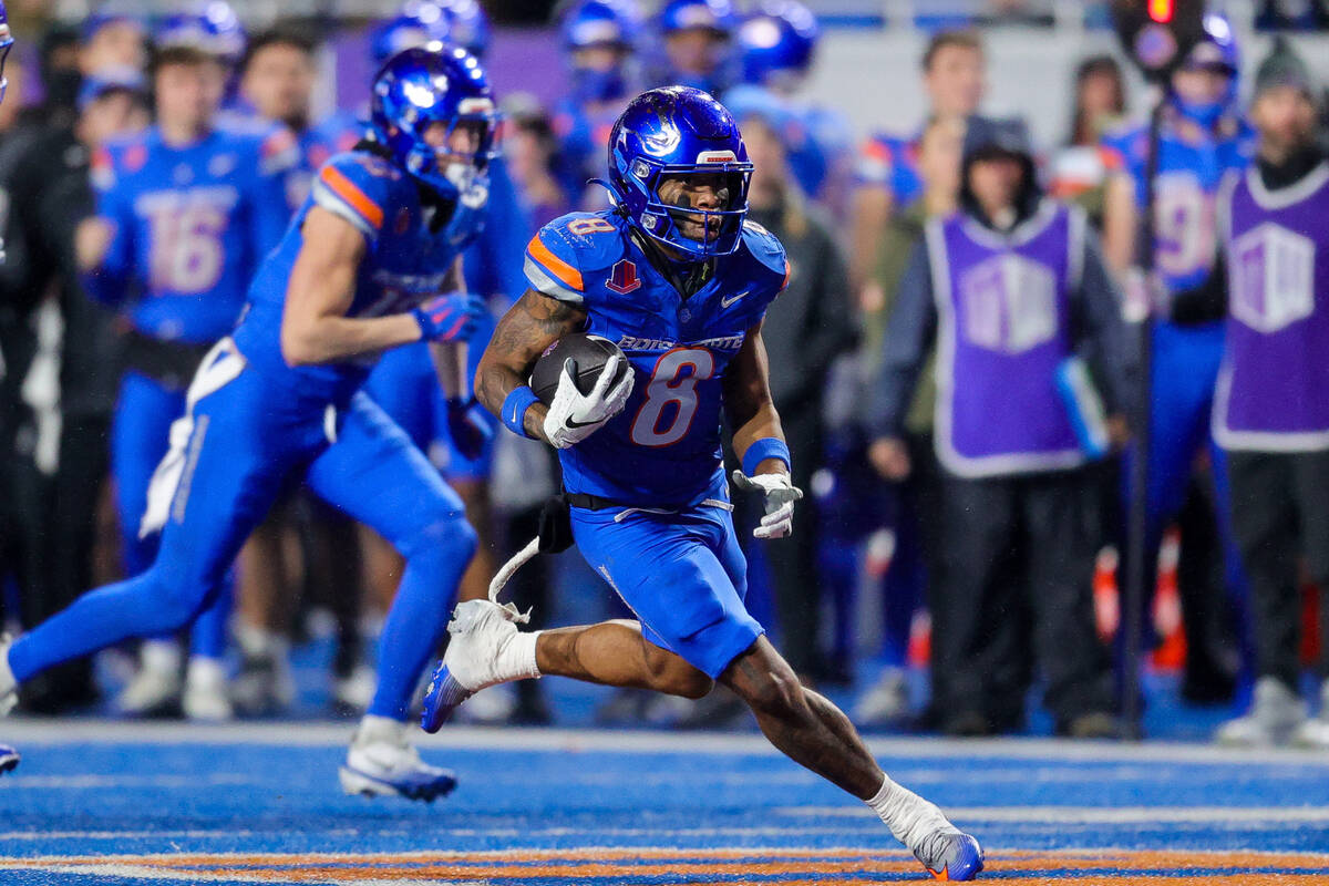 Boise State running back Malik Sherrod (8) runs with the ball after catching it for a touchdown ...