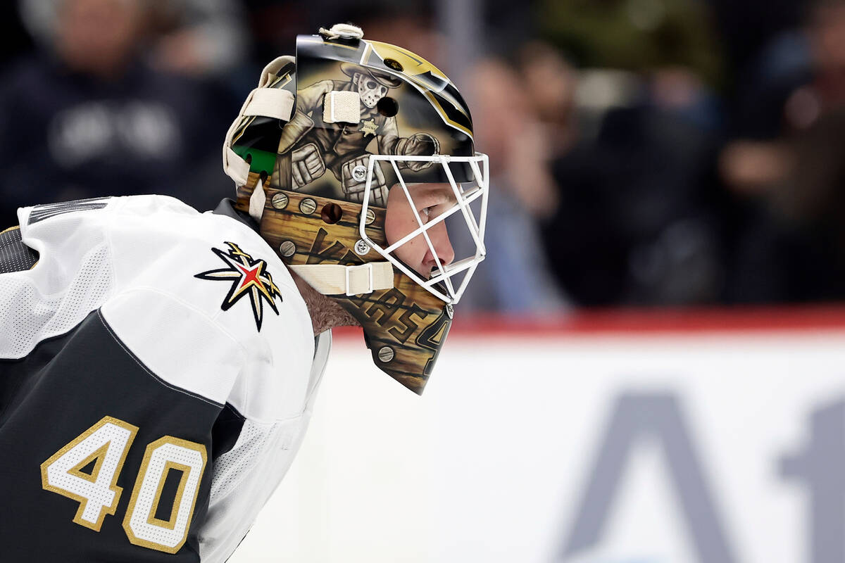 Vegas Golden Knights goaltender Akira Schmid (40) looks on during the second period of an NHL h ...