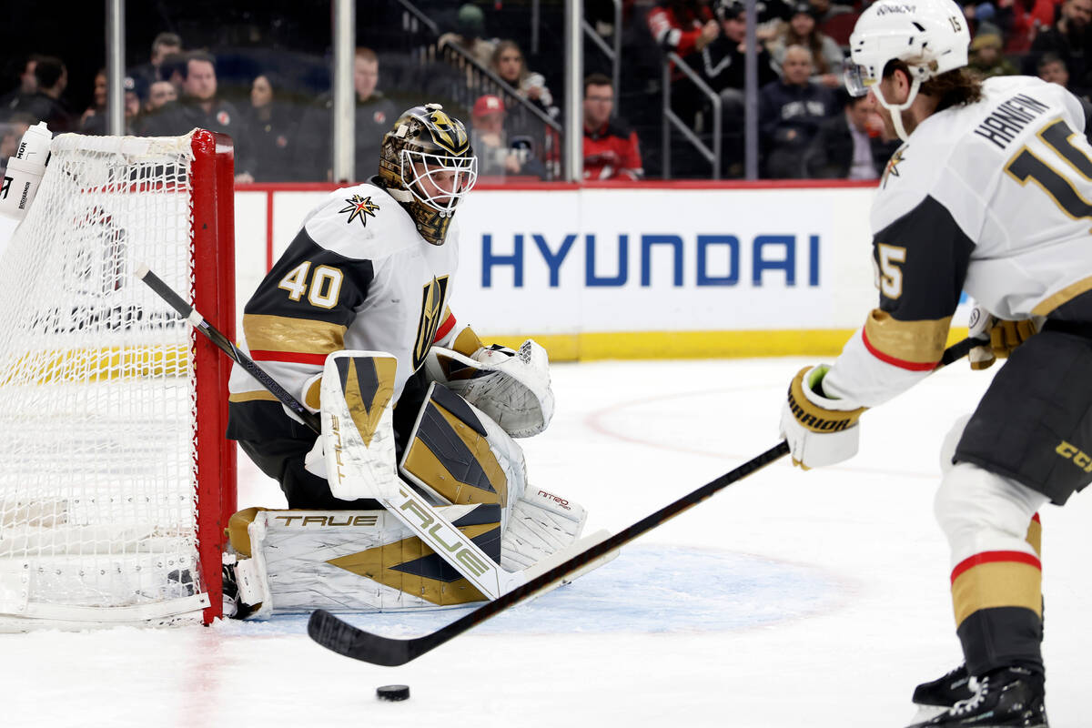 Vegas Golden Knights goaltender Akira Schmid (40) looks on during the second period of an NHL h ...