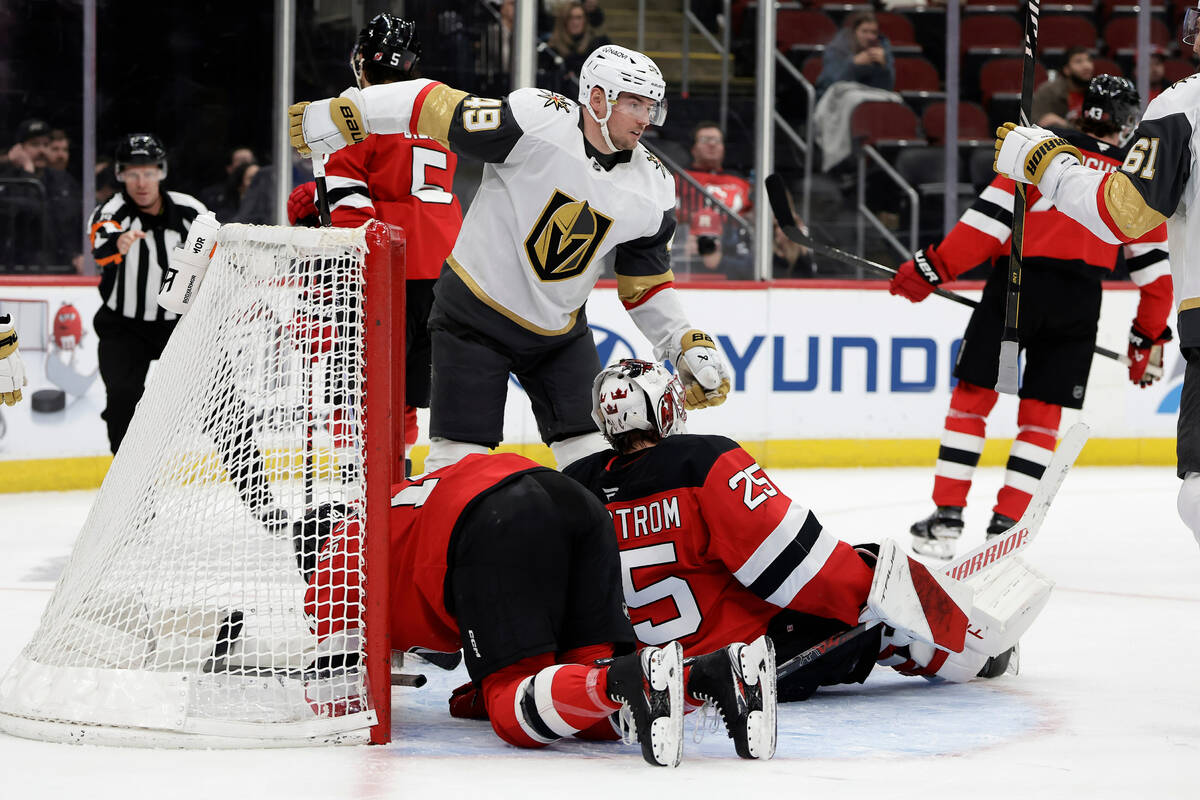 Vegas Golden Knights left wing Ivan Barbashev (49) reacts after scoring a goal past New Jersey ...