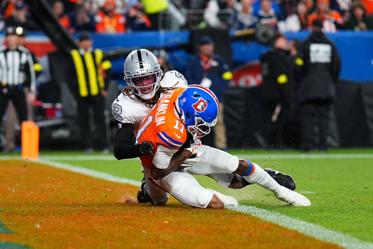 Denver Broncos wide receiver Troy Franklin (11) scores a touchdown against Las Vegas Raiders co ...