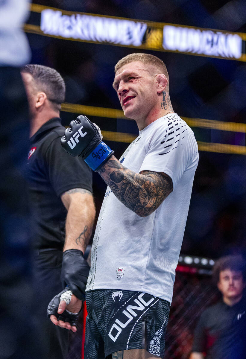 Chris Duncan celebrates his defeat of Terrance McKinney during their lightweight fight in UFC 3 ...