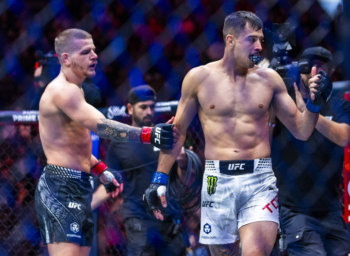 Grant Dawson reaches out to congratulate Manuel Torres after a Torres win during their lightwei ...