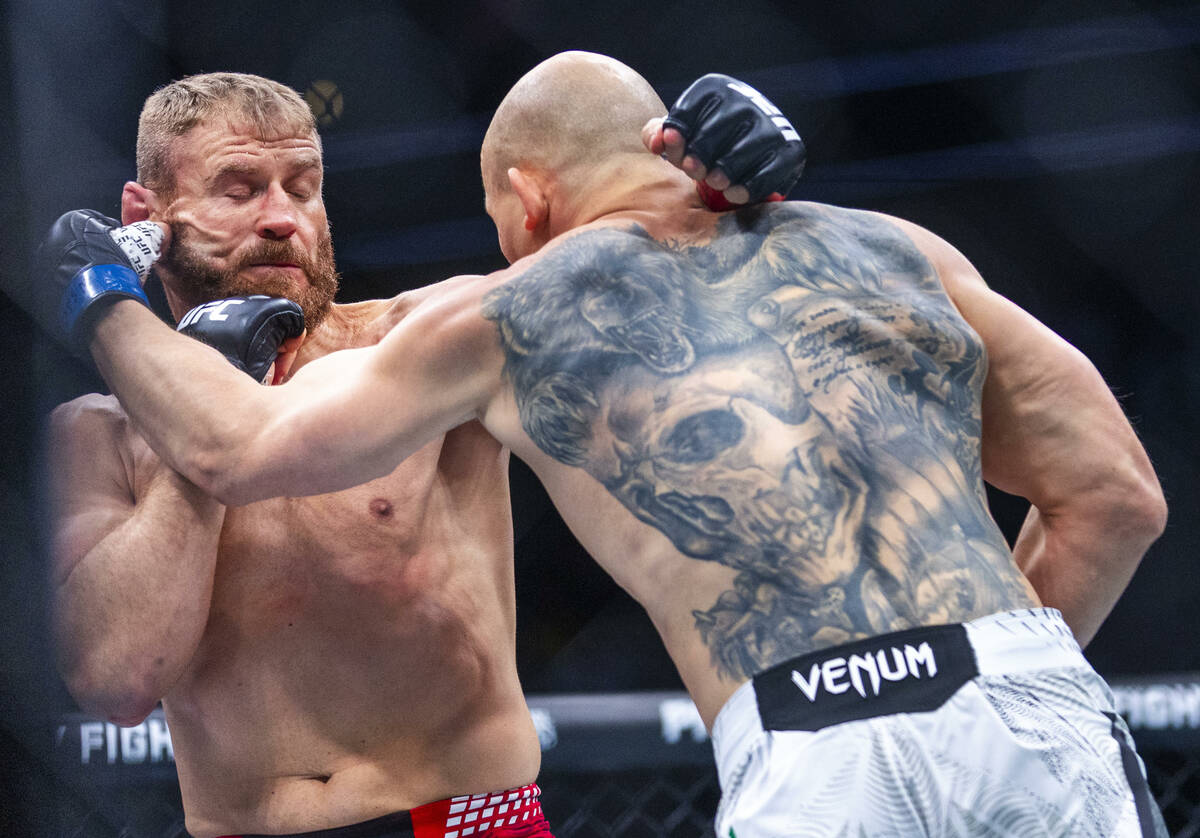 Jan Blachowicz takes a finger to the face from Bogdan Guskov during their light heavyweight fig ...