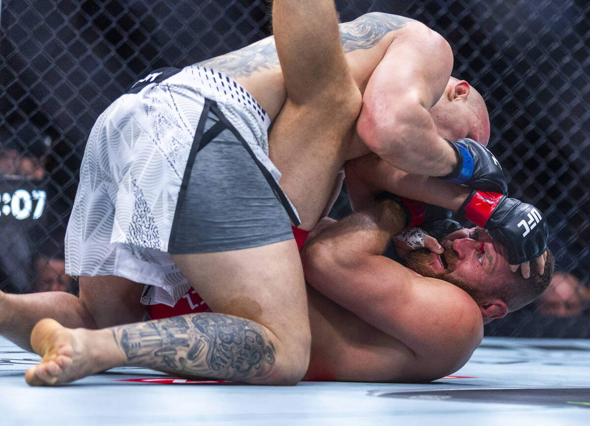 Bogdan Guskov dominates Jan Blachowicz during their light heavyweight fight in UFC 323 at the T ...