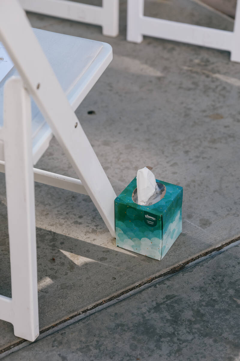 Kleenex boxes sit out for audience members before a memorial event commemorating the 2023 UNLV ...