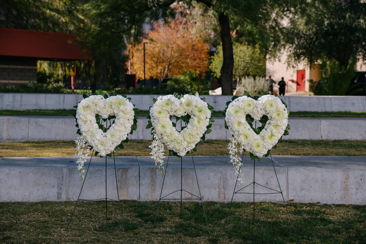 Three flower wreaths -- representing Jerry Cha-Jan Chang, Patricia Navarro Velez and Naoko Take ...