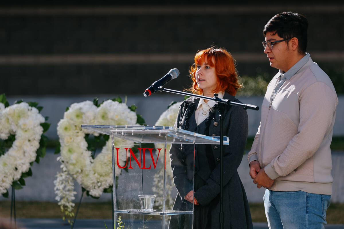 Kayla Cornwell and Mark Robles speak during a memorial event for the 2023 shooting on campus on ...