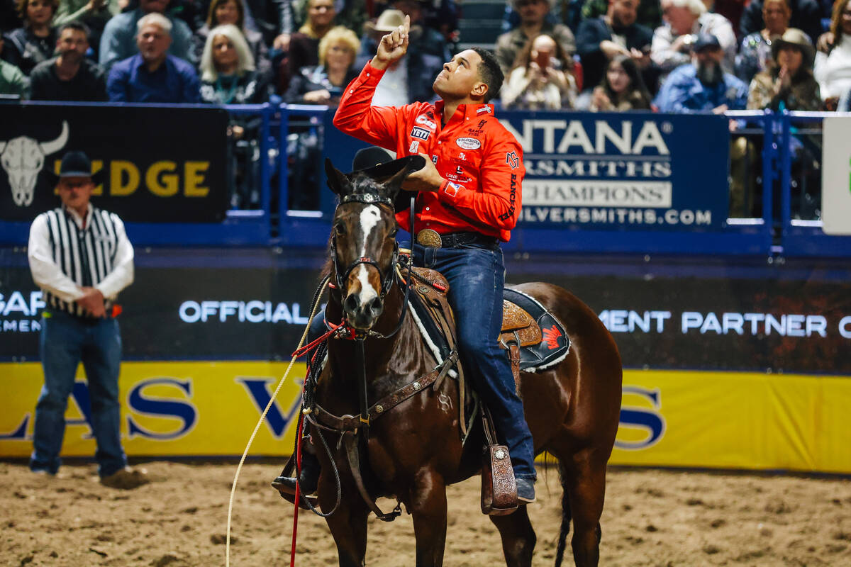 Shad Mayfield looks up on day four of the National Finals Rodeo at the Thomas & Mack Center ...