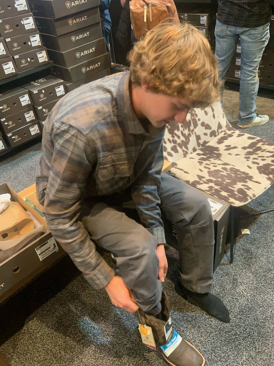 Charlee Read crafts a custom cowboy hat at the Gigi Pip booth on the floor of the massive Cowbo ...