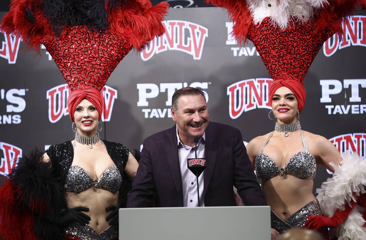 UNLV football coach Dan Mullen responds to questions following the team’s selection for ...