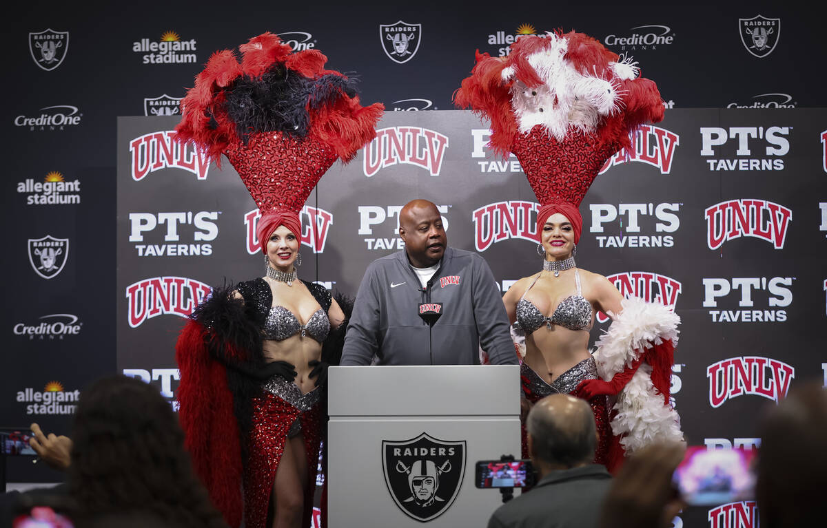 UNLV athletic director Erick Harper announces the team’s bowl game selection during a pr ...