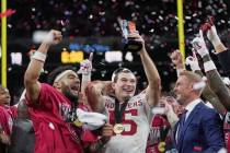 Indiana's Fernando Mendoza celebrates after the Big Ten championship NCAA college football ...