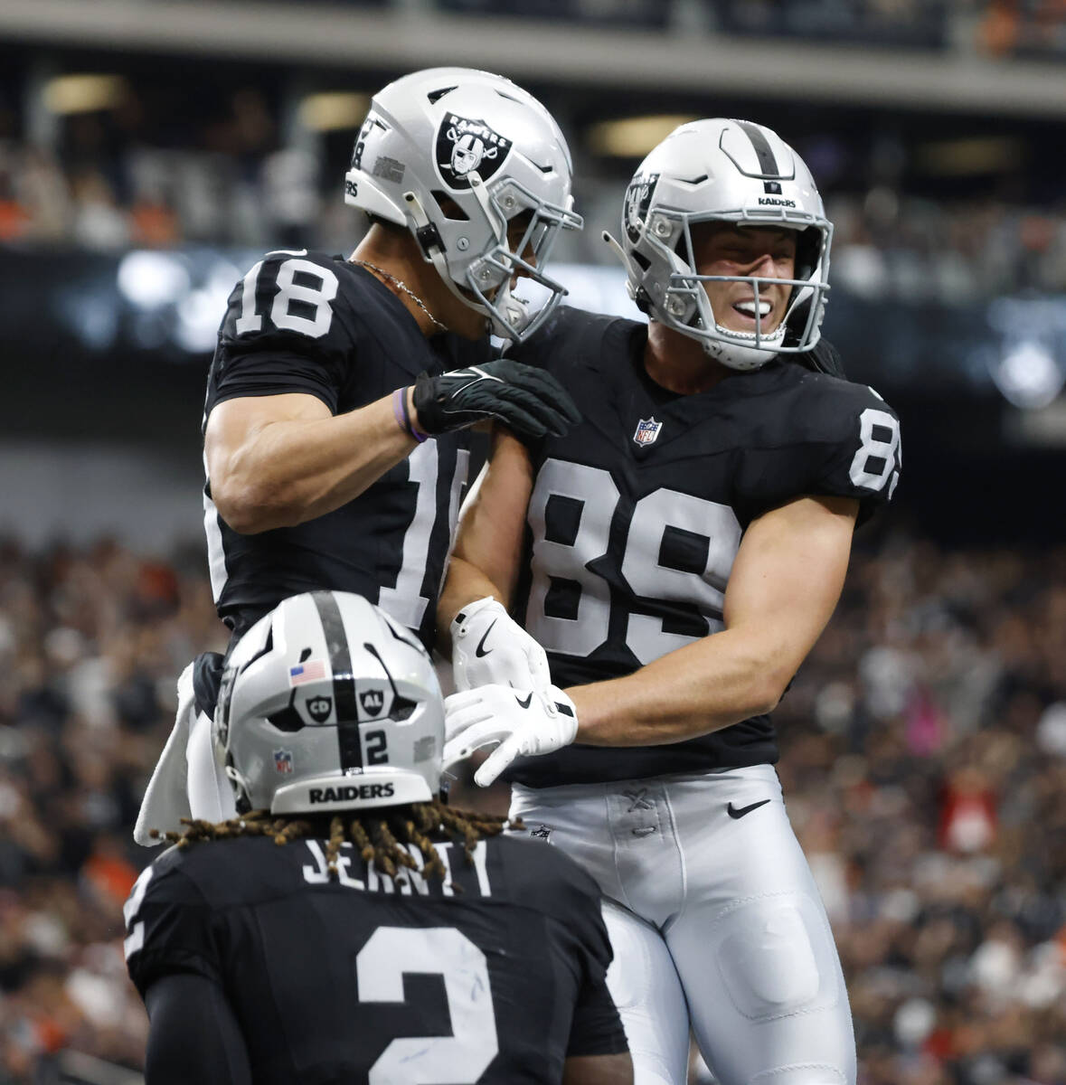 Raiders tight end Brock Bowers (89) celebrates his touchdown with running back Ashton Jeanty (2 ...