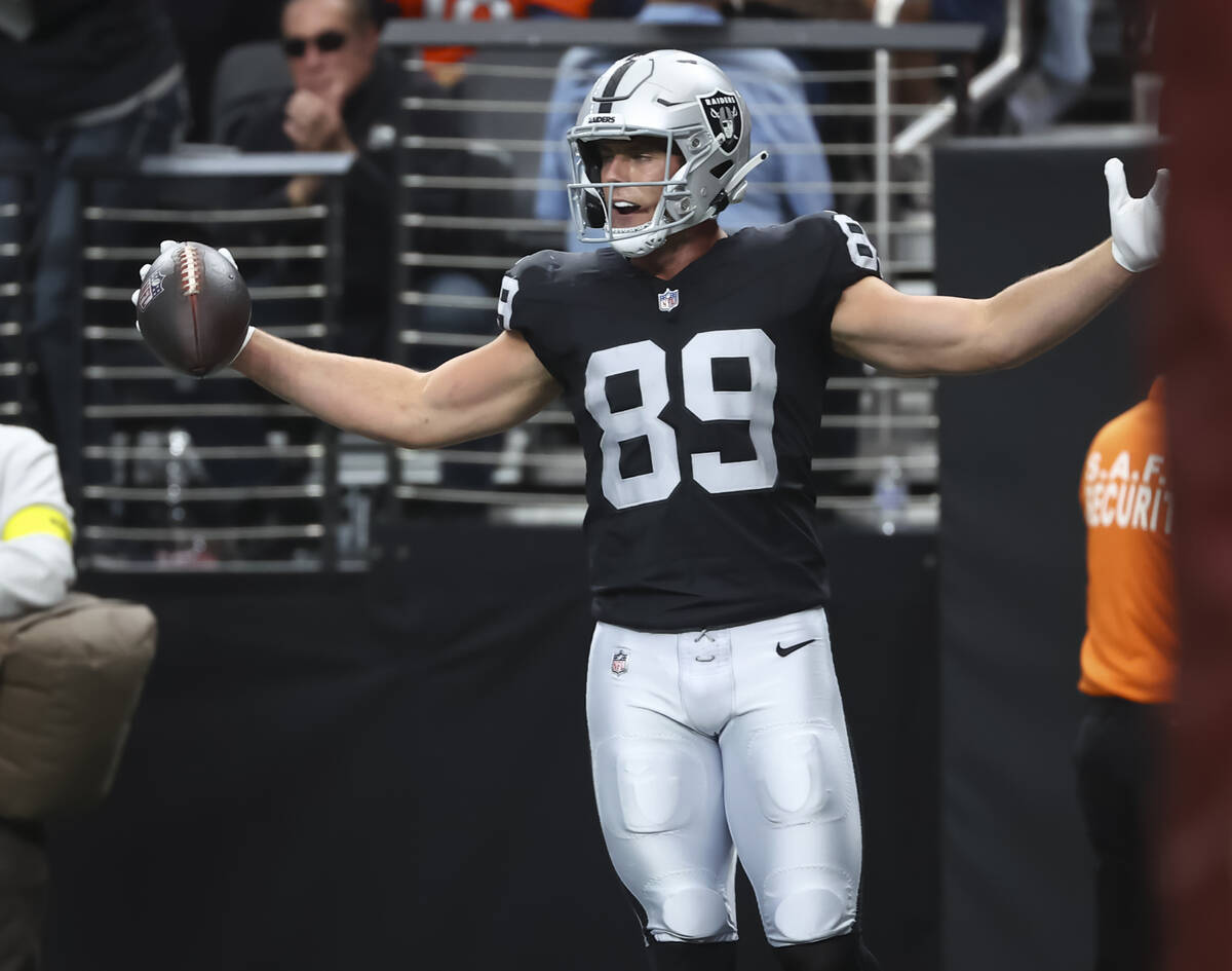 Raiders tight end Brock Bowers (89) celebrates after scoring a touchdown against the Denver Bro ...