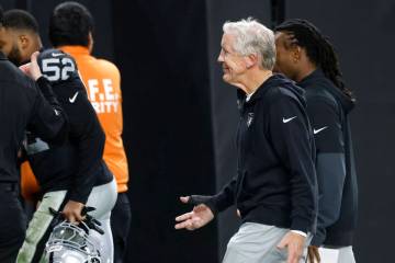 Raiders head coach Pete Carroll leaves the field after an NFL game against the Denver Broncos a ...