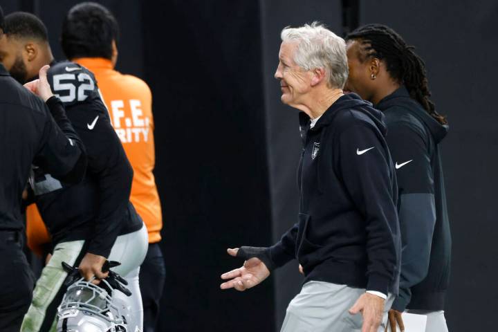 Raiders head coach Pete Carroll leaves the field after an NFL game against the Denver Broncos a ...