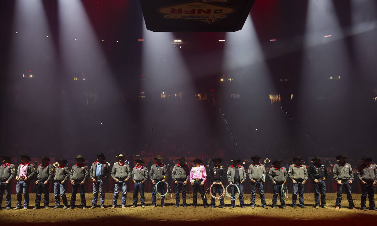 Competitors are introduced before the start of the fifth go-round of the National Finals Rodeo ...