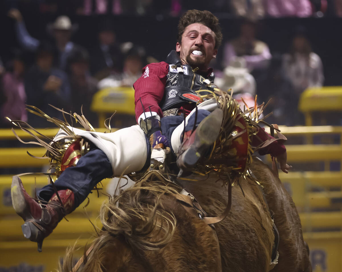 Garrett Shadbolt rides Tator Tot while competing in bareback riding during the fifth go-round o ...