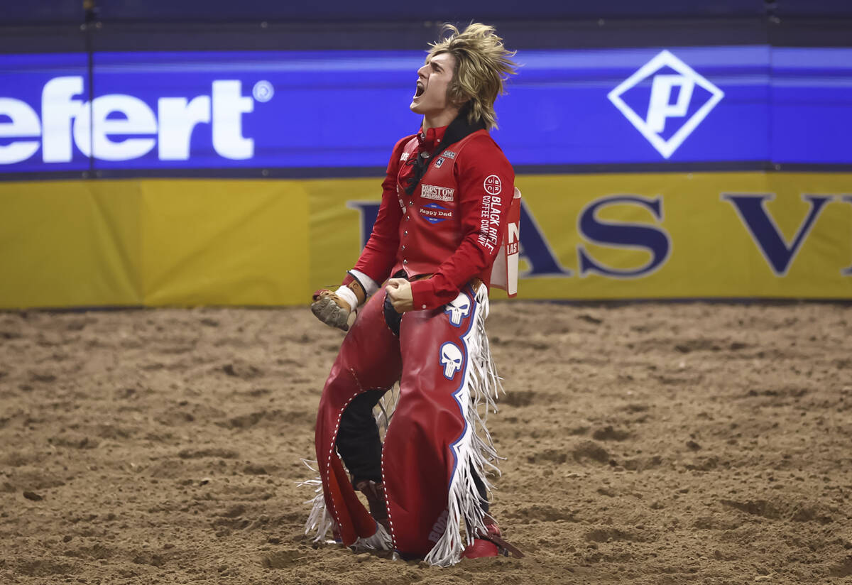 Rocker Steiner reacts after placing first in bareback riding during the fifth go-round of the N ...