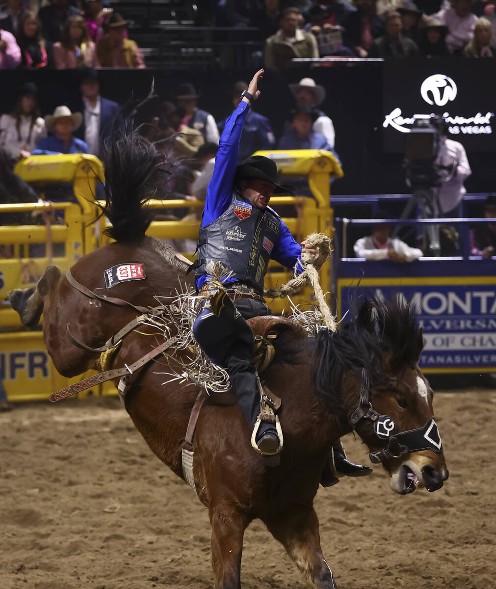 Statler Wright rides Lindsey’s Thunder Rolz while competing in saddle bronc riding durin ...