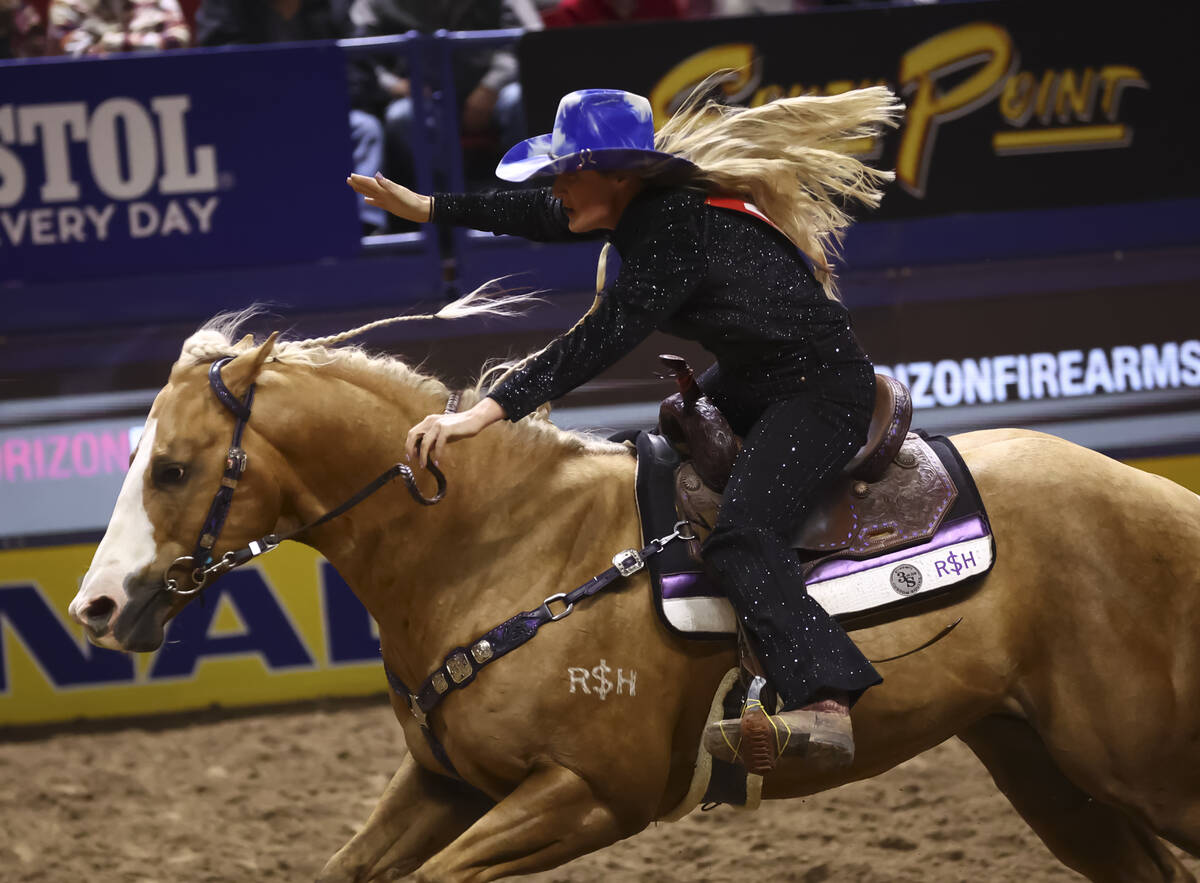 Tricia Aldridge competes in barrel racing during the fifth go-round of the National Finals Rode ...