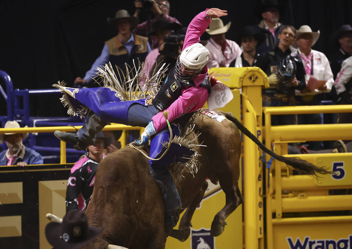 Mason Moody rides Wild Bill while competing in bull riding during the fifth go-round of the Nat ...