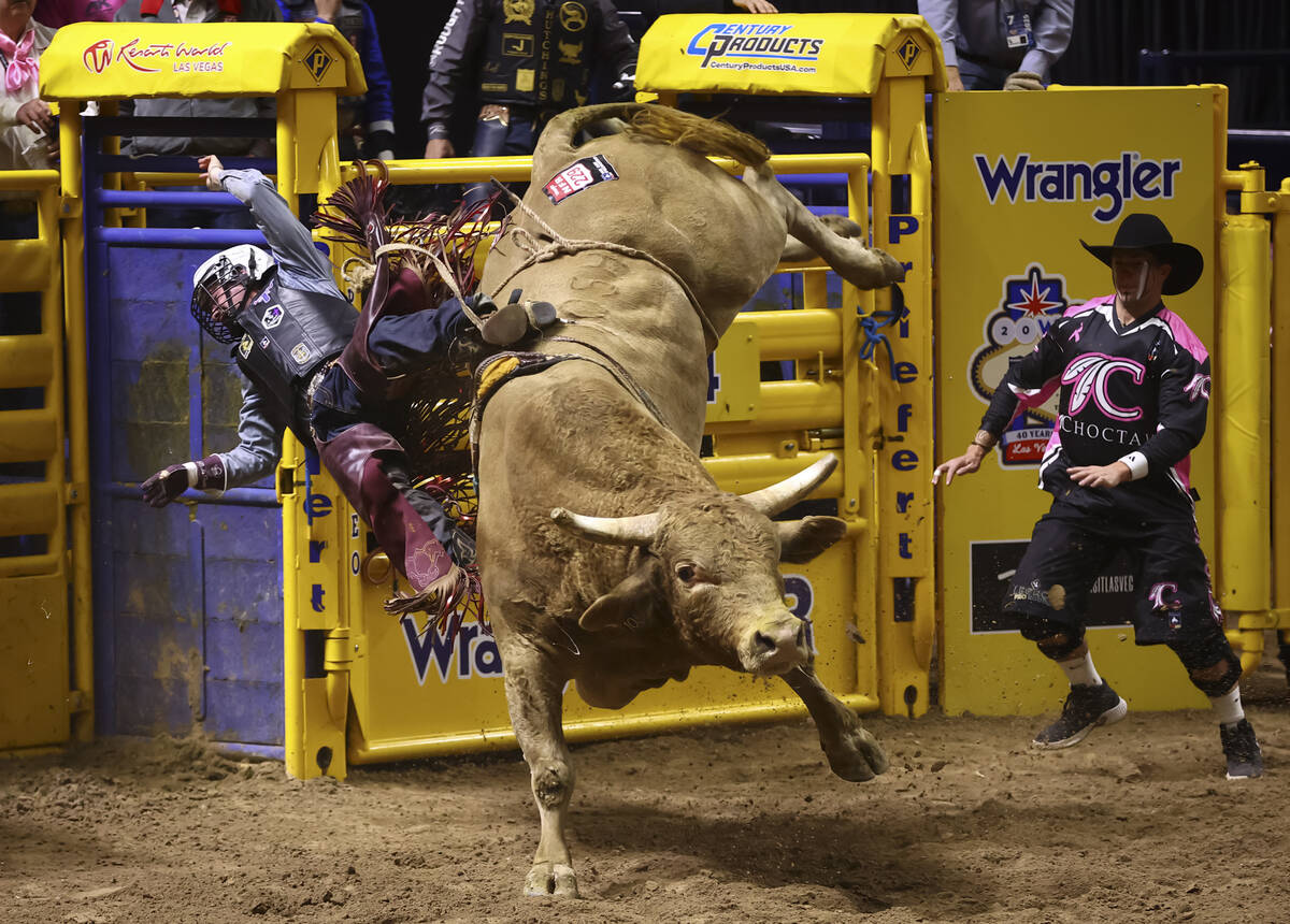 Rawley Johnson gets bucked from Rick’s Honky Tonk while competing in bull riding during ...