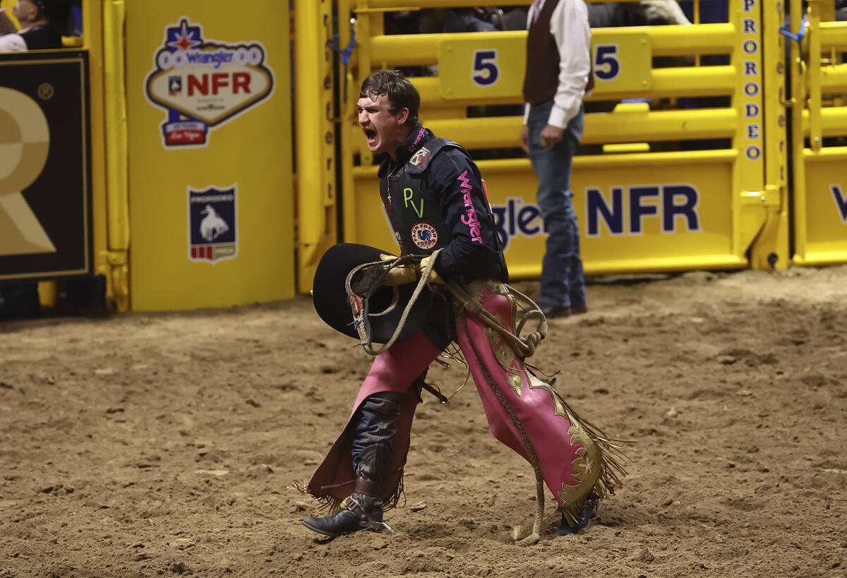 JR Stratford reacts after competing in bull riding during the fifth go-round of the National Fi ...