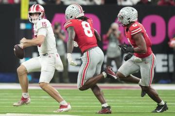Indiana's Fernando Mendoza scrambles during the second half of the Big Ten championship NC ...