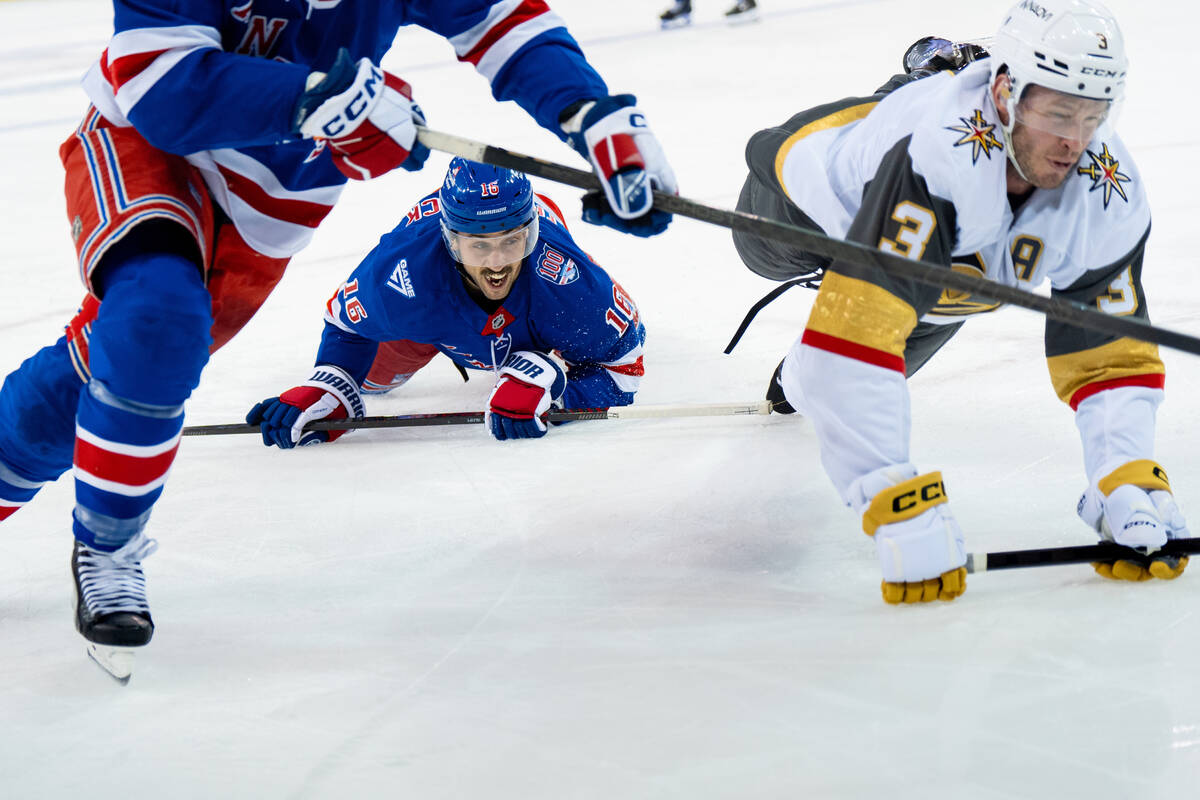 New York Rangers center Vincent Trocheck (16) and Vegas Golden Knights defenseman Brayden McNab ...