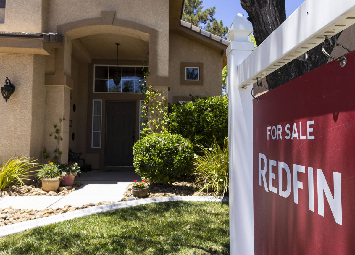 REDFIN's for sale sign is posted outside a single family house at Novara Lane on Wednesday ...