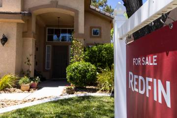 REDFIN's for sale sign is posted outside a single family house at Novara Lane on Wednesday ...