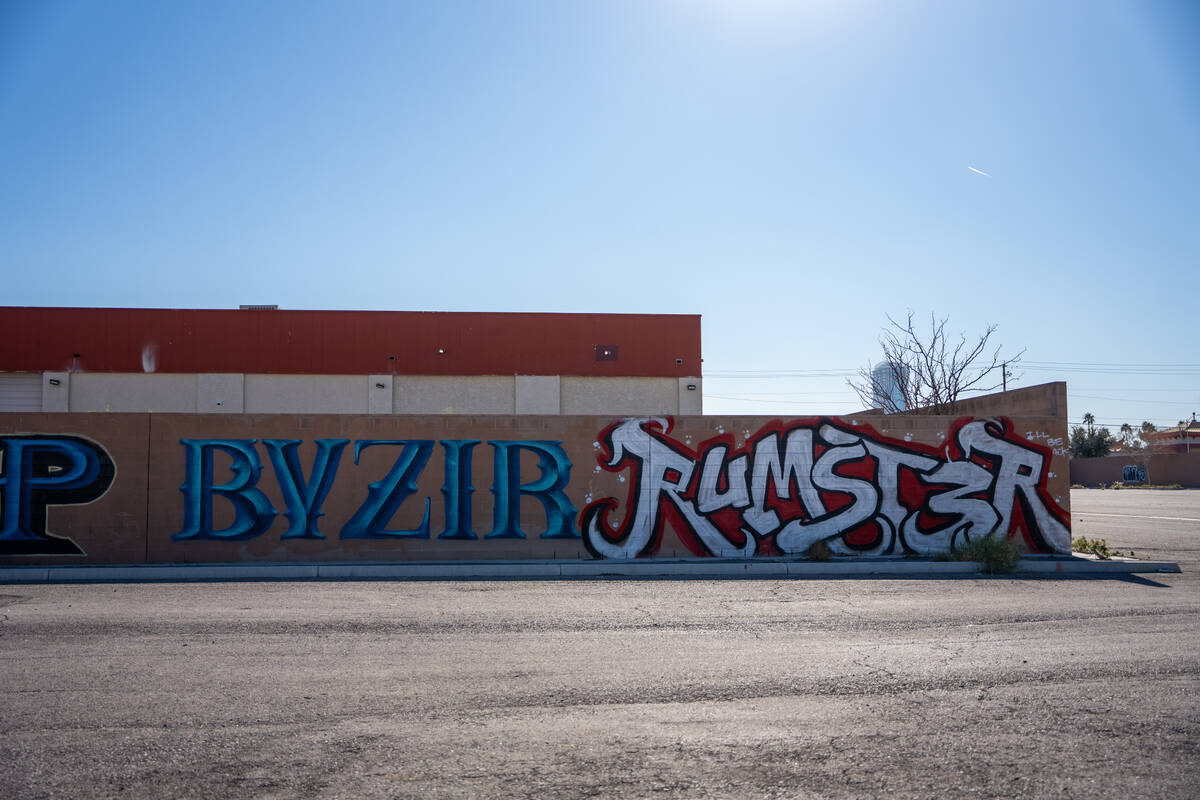 A vacant lot covered in graffiti sits along Spring Mountain Road between Wynn Road and Valley V ...