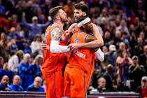 Oklahoma City Thunder center/forward Chet Holmgren (7), center, celebrates with Oklahoma City T ...