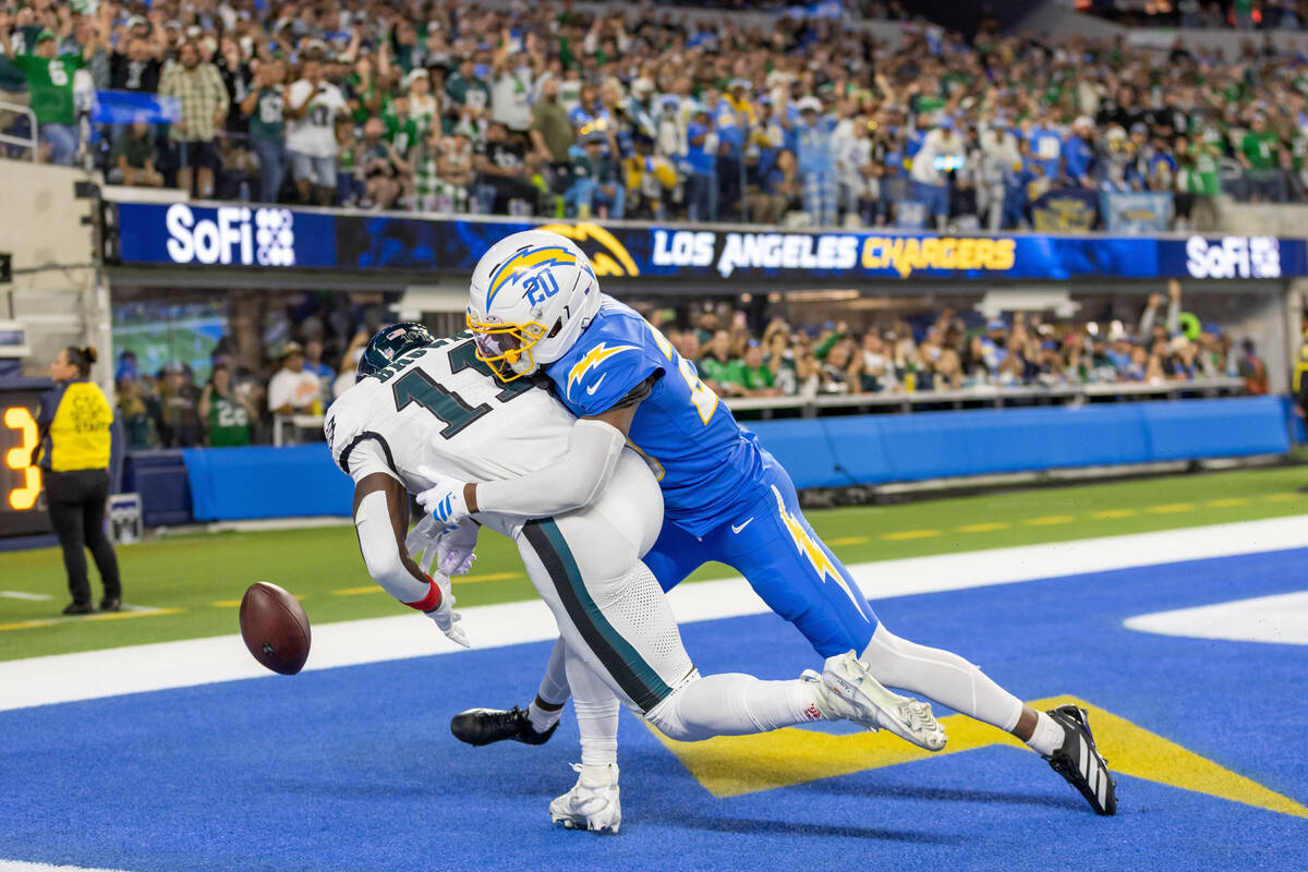 Los Angeles Chargers cornerback Cam Hart (20) knocks a pass down intended for Philadelphia Eagl ...