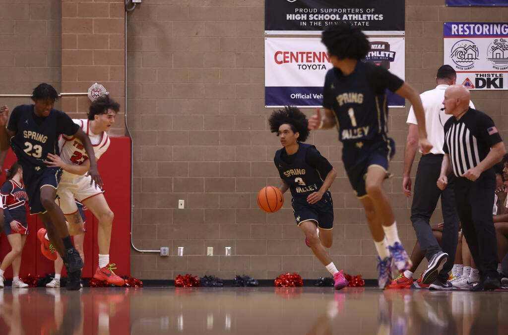 Spring Valley guard James Carson (3) brings the ball up court against Arbor View during the sec ...