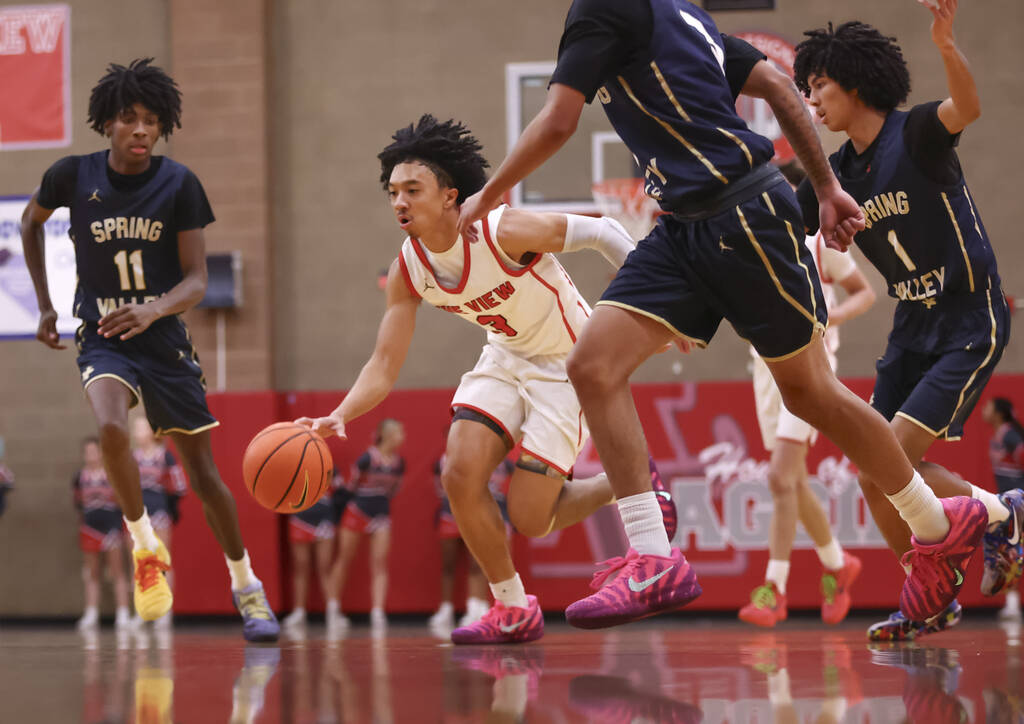 Arbor View guard Jaedon Johnson (3) brings the ball up court against Spring Valley during the f ...