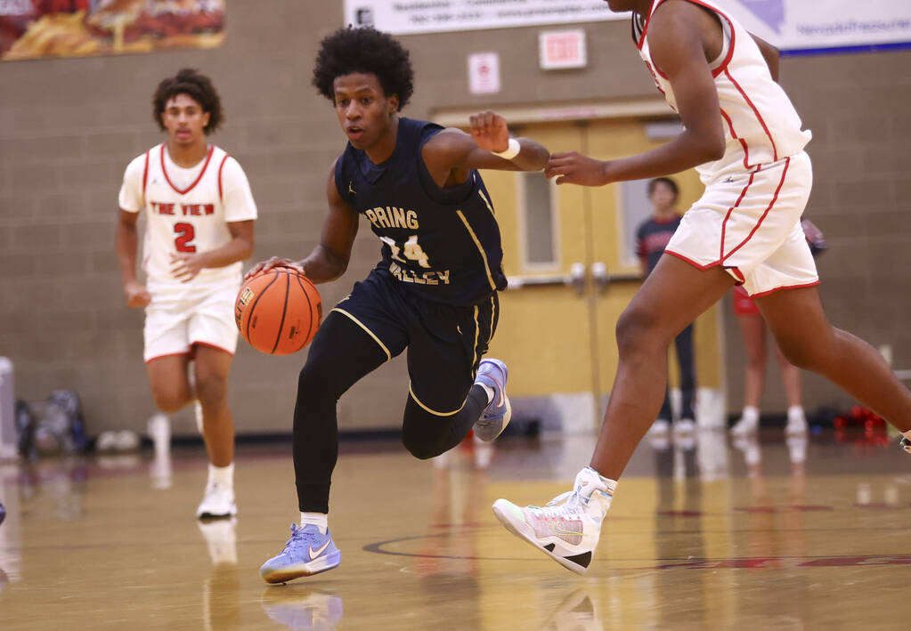 Spring Valley guard Dwayne Benson (24) drives to the basket against Arbor View during the secon ...