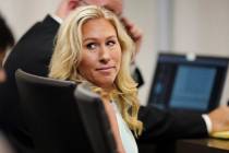 In this file photo, U.S. Rep. Marjorie Taylor Greene sits in the courtroom, April 22, 2022, in ...