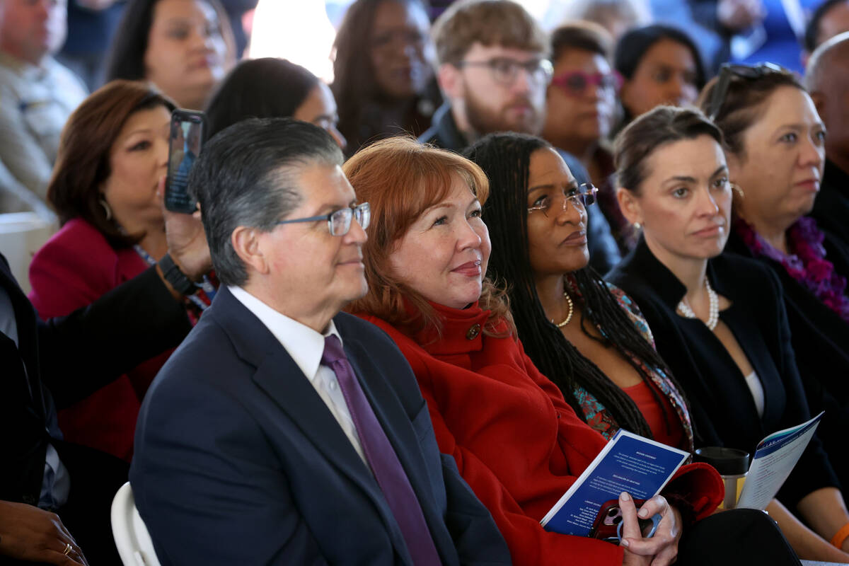 Community members listen to a speaker during the grand opening of the new West Las Vegas Librar ...