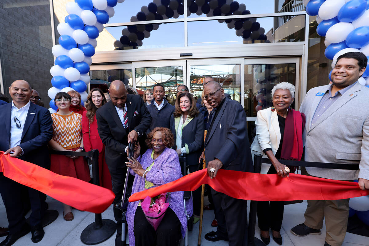 Historic Westside community leader Ruby Duncan cuts the ribbon during the grand opening of the ...