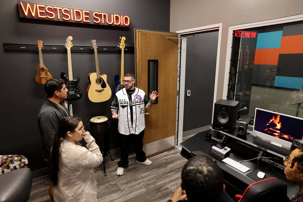 Multimedia Supervisor Robert McGovern gives a tour of Westside Studio inside the Multimedia Lab ...