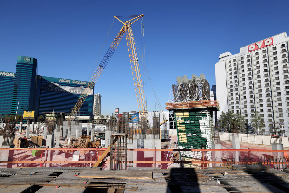 A custom Athletics green buttress concrete formation with cooling lines is seen curing construc ...